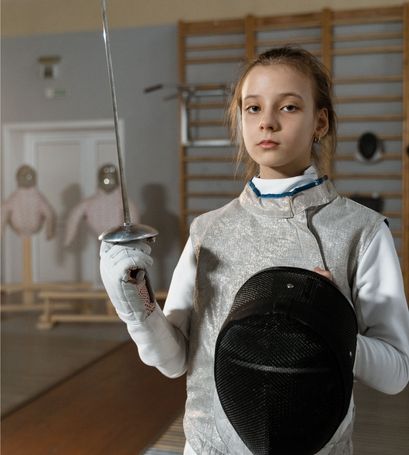 Jeune escrimeur à l'entraînement, accompagnement des parents - Phrases d'Armes